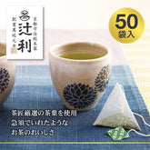 A cup of freshly steeped Genmaicha, showing the light, golden-green color and steam, with the nutty roasted rice aroma implied.